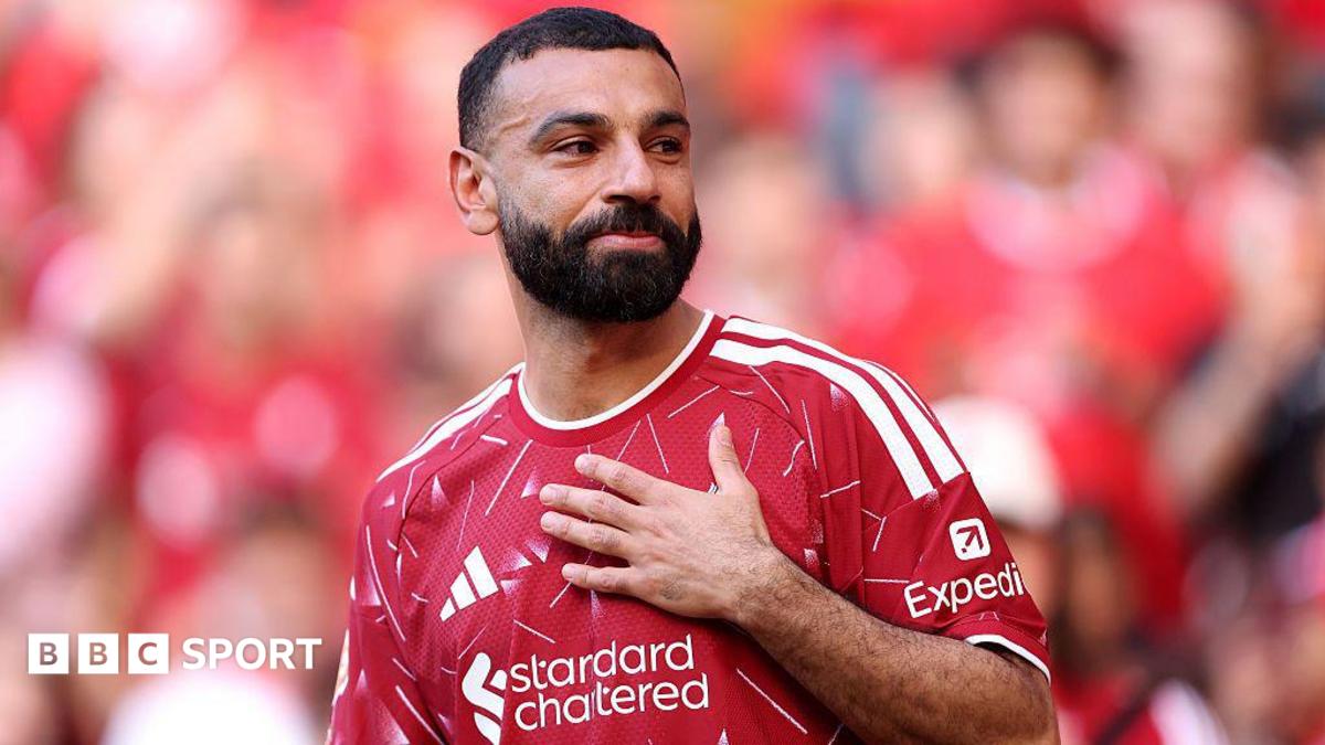 Mohamed Salah of Liverpool appears emotional as he acknowledges the fans following his final appearance for the club during the Premier League match between Liverpool and Brentford