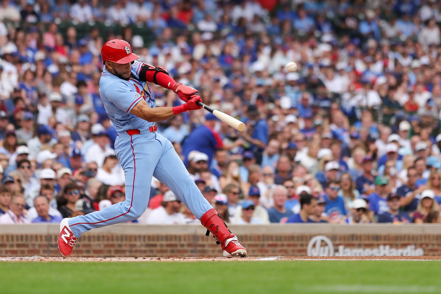 Joshua Báez, of the St. Louis Cardinals, hit the first pitch he saw in the majors for a home run, in the first inning against the Cubs at Wrigley Field on Saturday, August 15.