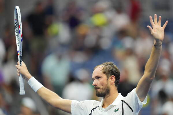 Daniil Medvedev, of Russia, celebrates after he defeated Hugo Gaston, of France, during the first round of the U.S. Open tennis championships Sunday, Aug. 30, 2026, in New York. (AP Photo/Kirsty Wigglesworth)