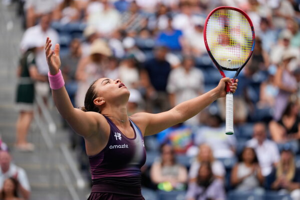 Jasmine Paolini, of Italy, reacts during the first round of the U.S. Open tennis championships against Veronika Erjavec, of Slovenia, Sunday, Aug. 30, 2026, in New York. (AP Photo/Yuki Iwamura)