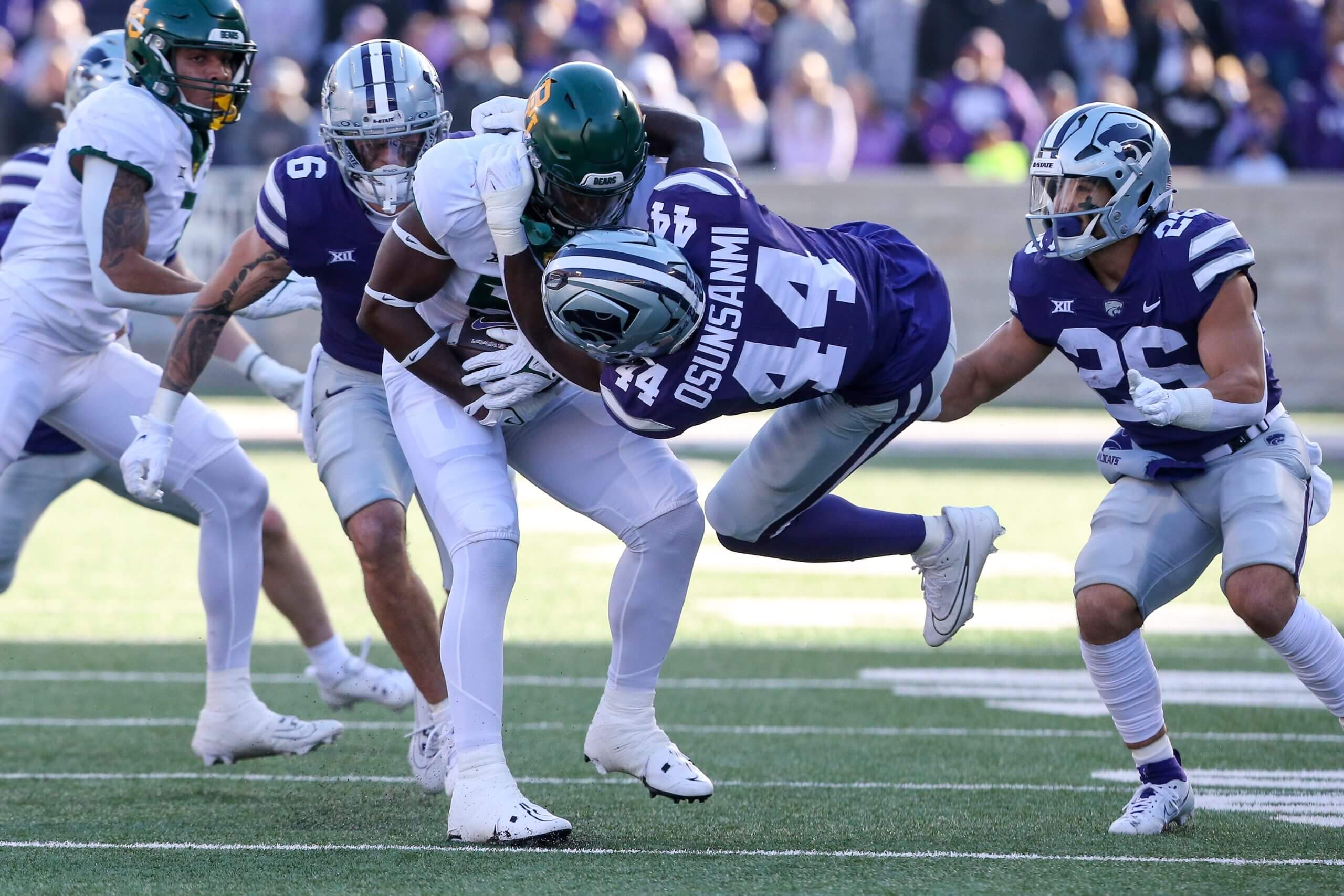 Tobi Osunsanmi tackles a player.