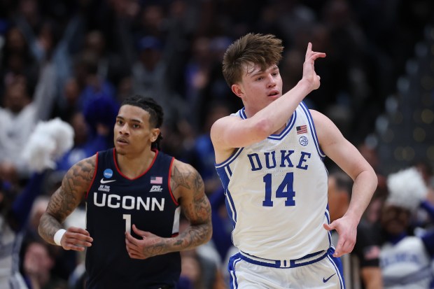 Former Duke star Nik Khamenia brings 6 feet 8, 215 pounds and a few comparisons to Huskies legend Alex Karaban to UConn. (Getty)