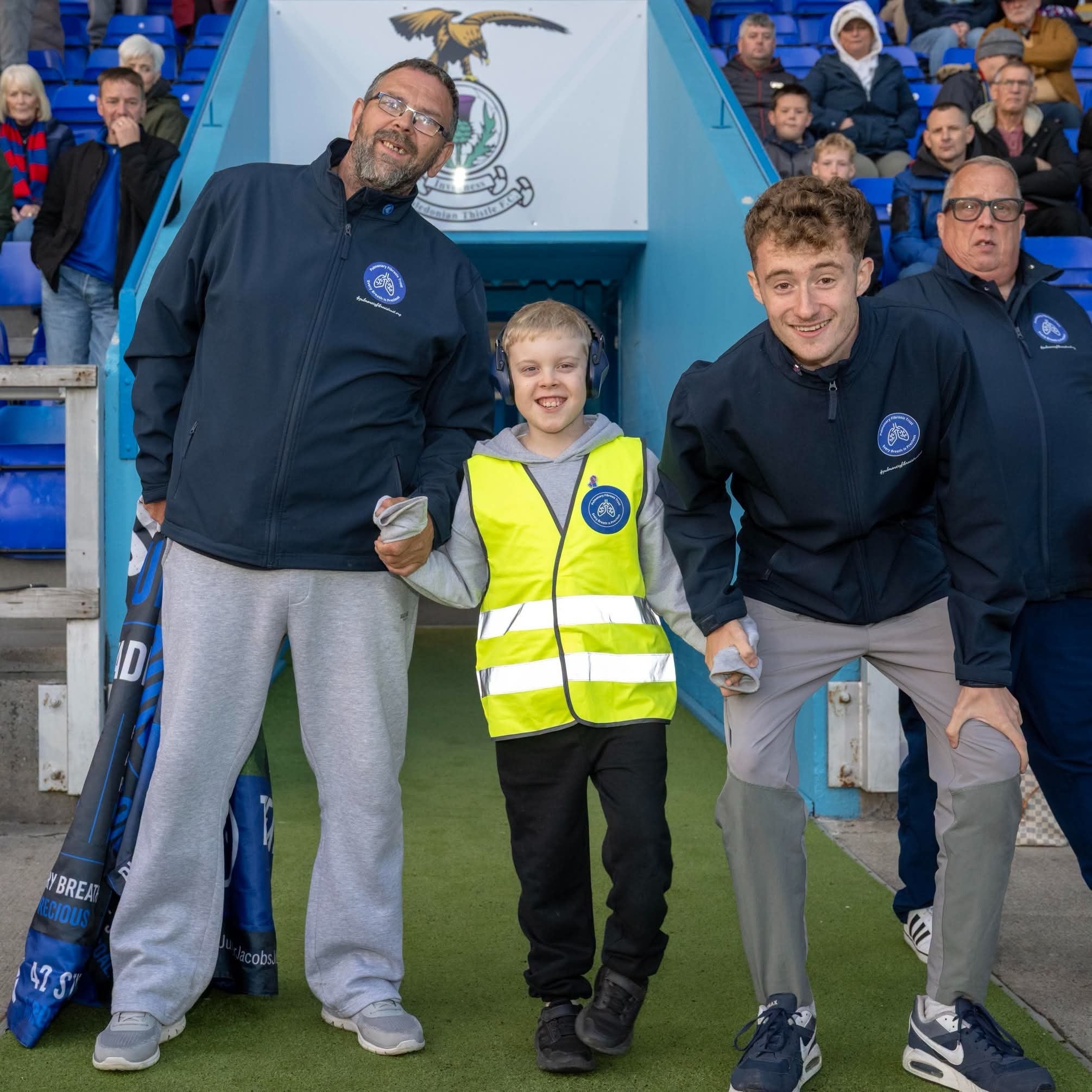 Jacob McDonald, at Inverness Caledonian Thistle with the family who walk each ground beside him dad Kenny, godfather Stuart Carter and grandson Alexander. (Family Handout/PA)