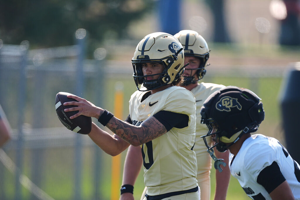 Colorado quarterback Julian Lewis during a practice at an NCAA college football training camp Thursday, Aug. 6, 2026, in Fountain, Colo. (AP Photo/David Zalubowski)