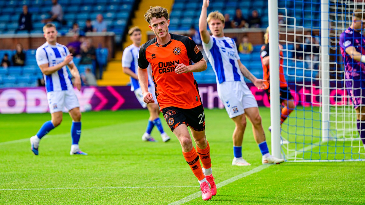 Jesse Randall wheels away after netting his first United goal