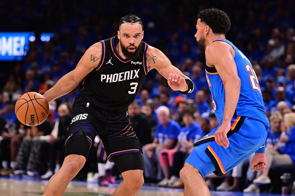 Dillon Brooks #3 of the Phoenix Suns handles the ball while being defended by Ajay Mitchell #25 of the Oklahoma City Thunder during the second half in Game One of the Western Conference First Round NBA Playoffs at Paycom Center on April 19, 2026 in Oklahoma City, 