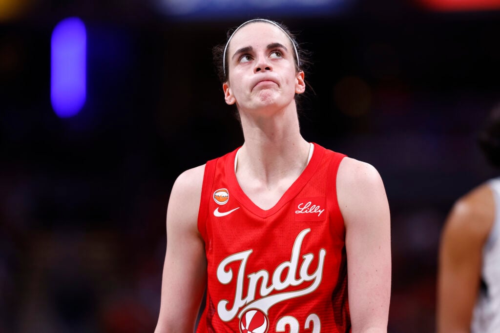 Indiana Fever guard Caitlin Clark (22) looks up at the big screen in the second half of play during a WNBA game between the Las Vegas Aces and the Indiana Fever on August 06 at Gainbridge Fieldhouse.