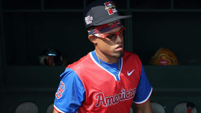 Franklin Arias #19 of the Boston Red Sox on the American League Team warms up