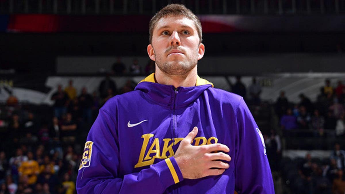 Matt Ryan stands for the National Anthem before a Lakers-Spurs game.