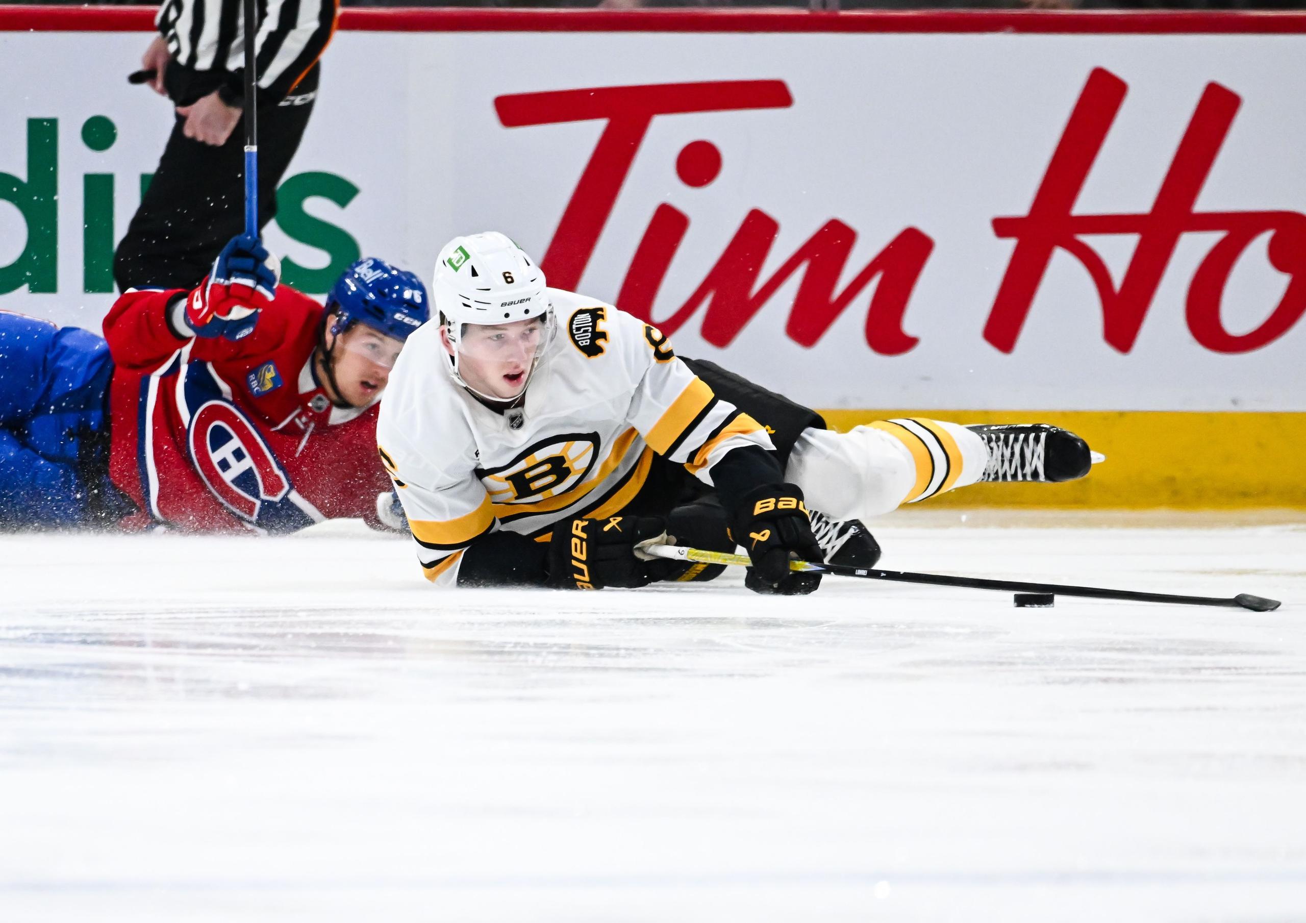 Mason Lohrei #6 of the Boston Bruins