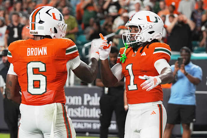 No. 7 Miami gains school-record 856 yards, rolls past Florida A&M 77-7