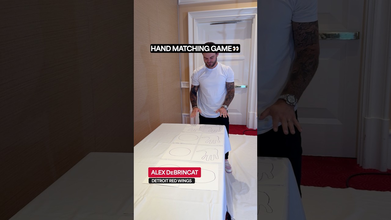 Players try their "hand" at this version of hopscotch ✋