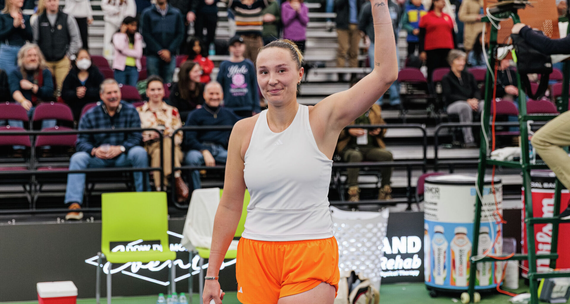 Alina Charaeva waves to the crowd following Sunday's Dow Tennis Classic singles final against Guo Hanyu, Feb. 22, 2026.