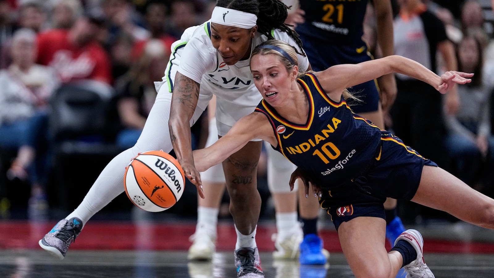 Caitlin Clark and Kelsey Mitchell help Fever keep home-court hope alive with 96-77 win over Lynx
