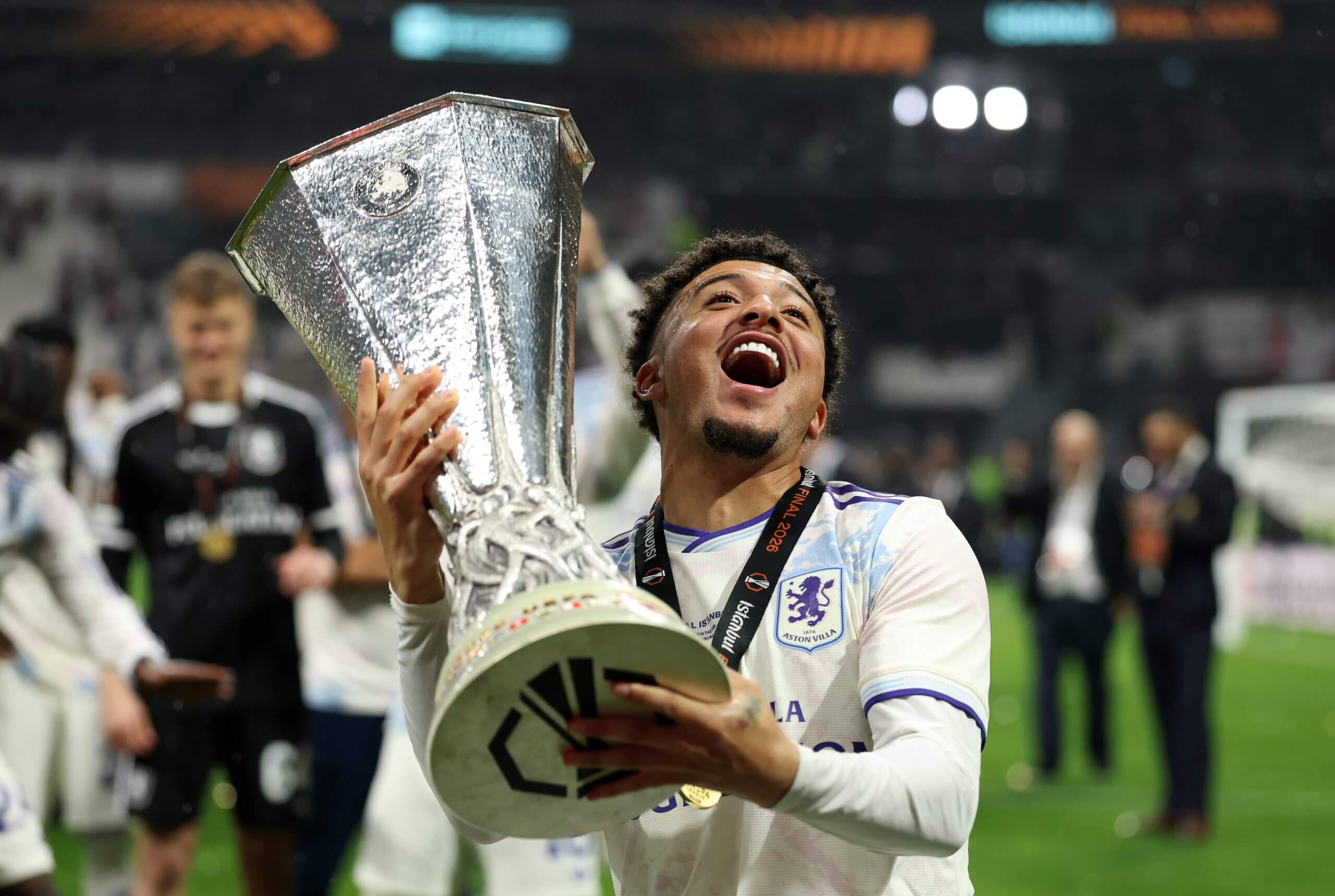 Jadon Sancho lifts the Europa League trophy with Aston Villa last season