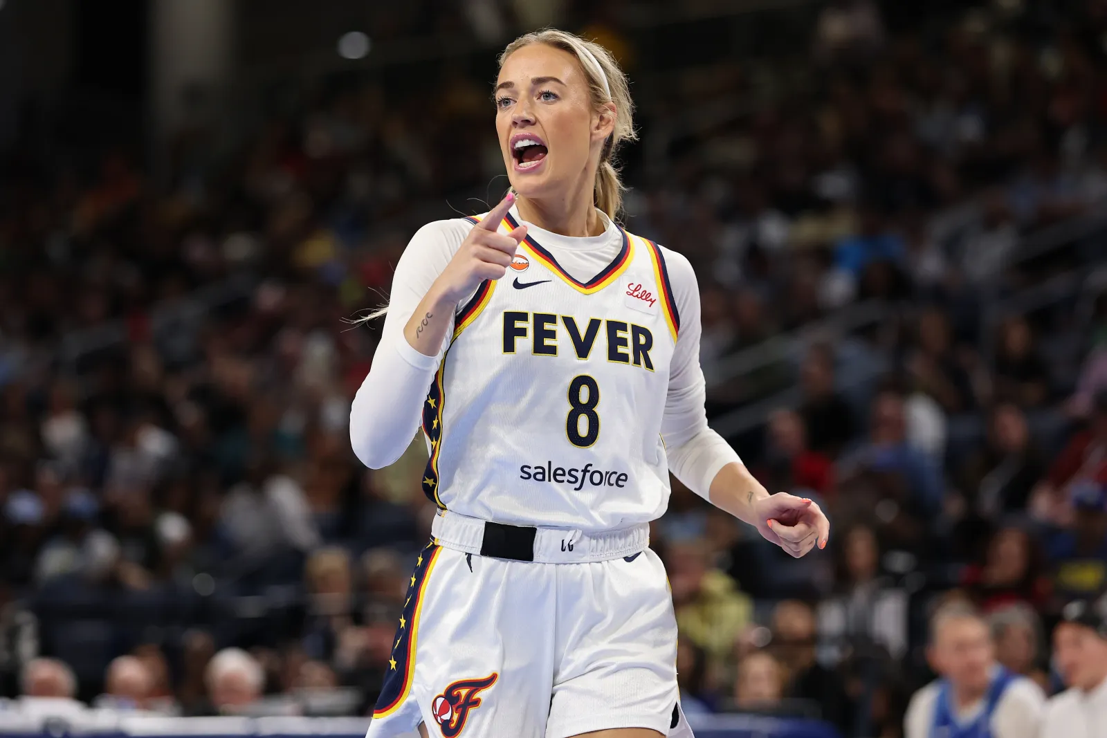Sophie Cunningham #8 of the Indiana Fever reacts against the Chicago Sky at Wintrust Arena on August 23, 2026, in Chicago, Illinois.