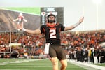FiLE - Oregon State quarterback Braden Atkinson (2) celebrates his touchdown during the second half of an NCAA college football game against Texas Tech, Saturday, Sept. 12, 2026, in Corvallis, Ore.
