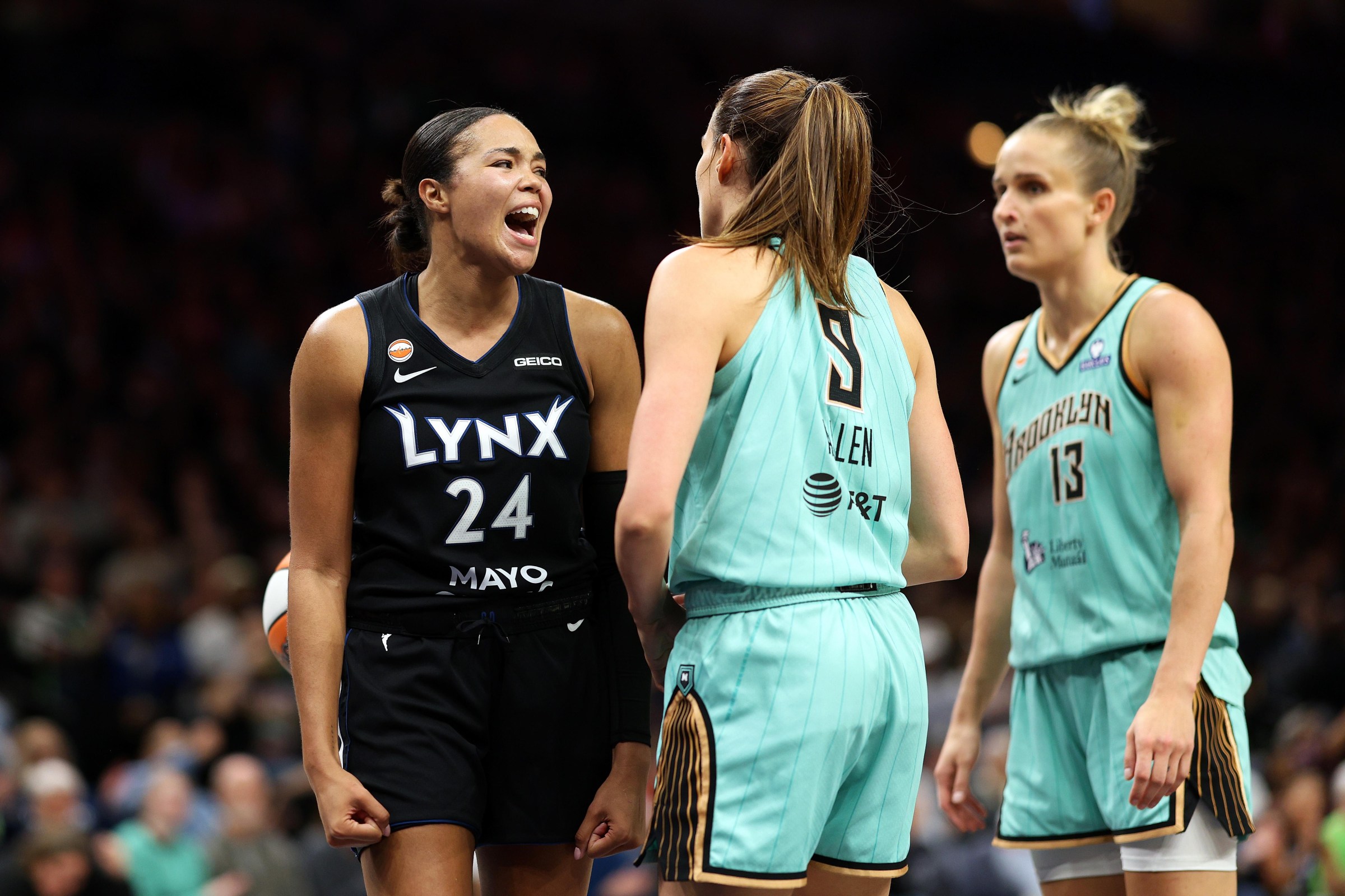 MINNEAPOLIS, MINNESOTA - SEPTEMBER 18: Napheesa Collier #24 of the Minnesota Lynx celebrates drawing a foul as Rebecca Allen #9 of the New York Liberty looks on in the third quarter at Target Center on September 18, 2026 in Minneapolis, Minnesota. The Liberty defeated the Lynx 93-81. NOTE TO USER: User expressly acknowledges and agrees that, by downloading and or using this photograph, User is consenting to the terms and conditions of the Getty Images License Agreement. (Photo by David Berding/Getty Images)
