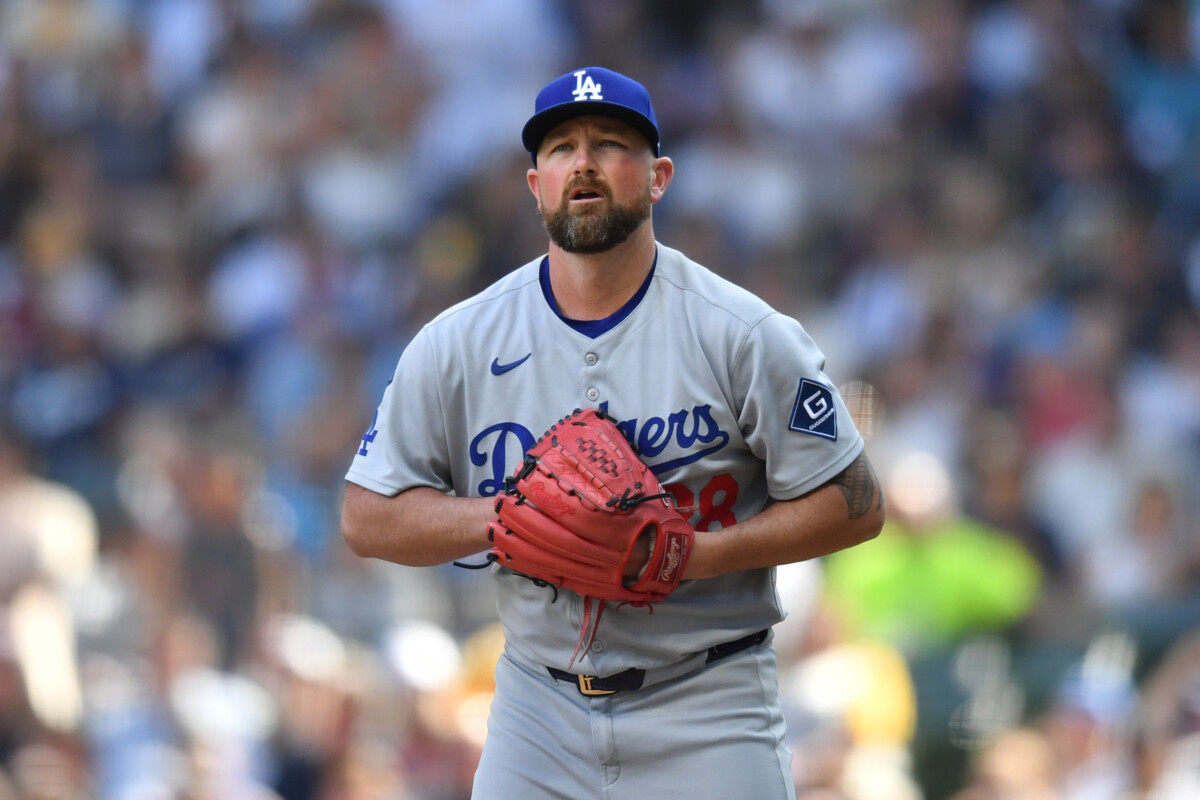 Jul 9, 2025; Milwaukee, Wisconsin, USA; Los Angeles Dodgers pitcher Kirby Yates (38) prepares to pitch during the tenth inning against the Milwaukee Brewers at American Family Field. Mandatory Credit: Patrick Gorski-Imagn Images