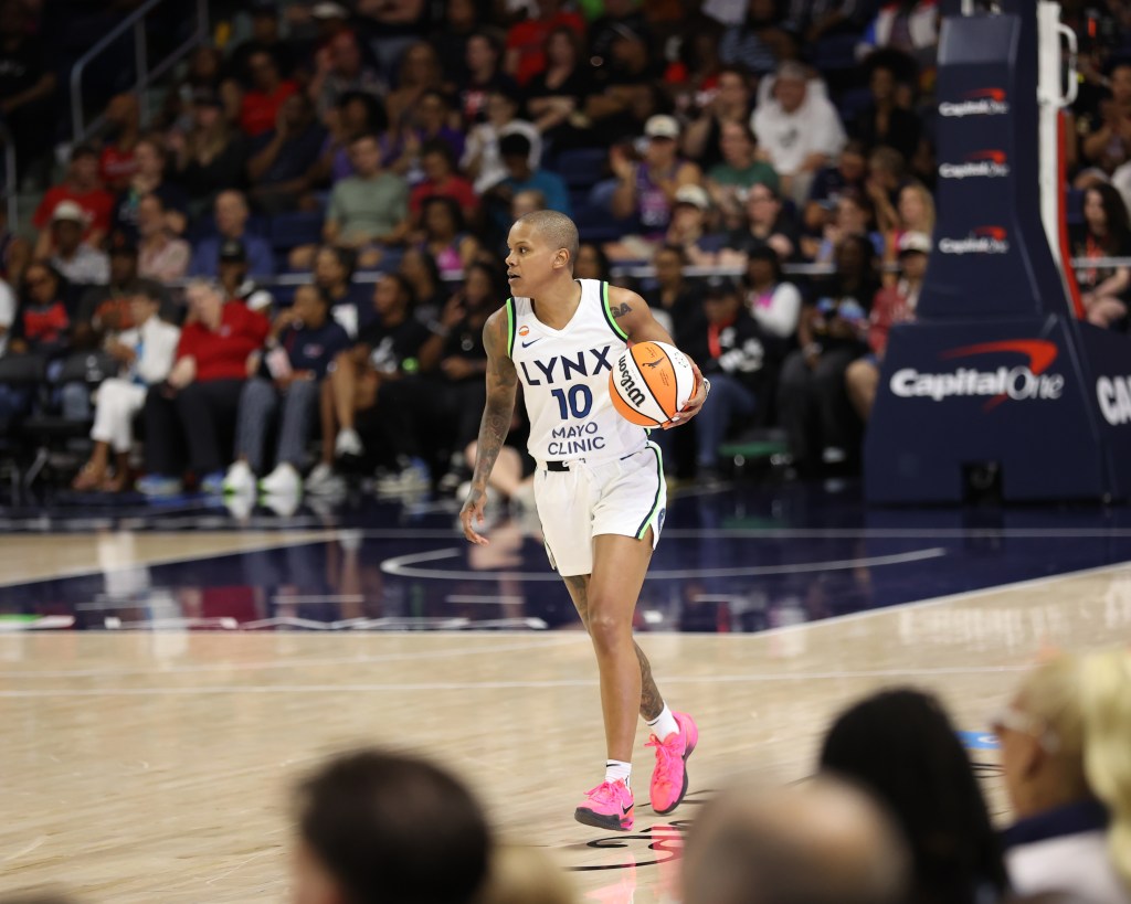 Courtney Williams of the Minnesota Lynx dribbles the ball during a game.
