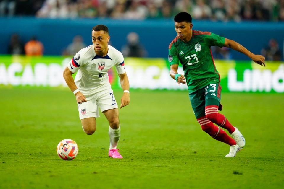 Sergino Dest #2 of USA battles with Jesus Gallardo #23 of Mexico during the 2023 CONCACAF Nations League semifinals on June 15, 2023 in Las Vegas (Photo by Louis Grasse/Getty Images)