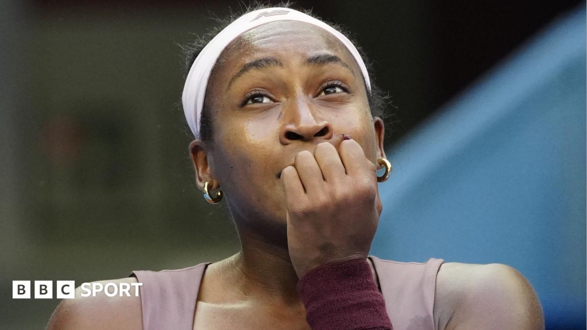 Coco Gauff covers her mouth during her China Open match against Elise Mertens
