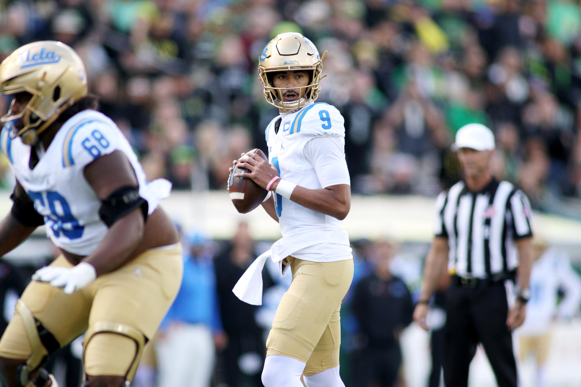 UCLA quarterback Nico Iamaleava looks to pass against Oregon on Saturday.