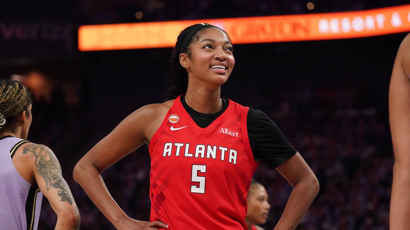 Oct 19, 2026; San Francisco, California, USA;  Atlanta Dream forward Angel Reese (5) smiles during a break in the action against the Golden State Valkyries in the third quarter of game two of the 2026 WNBA Finals at Chase Center.  Mandatory Credit: David Gonzales-Imagn Images