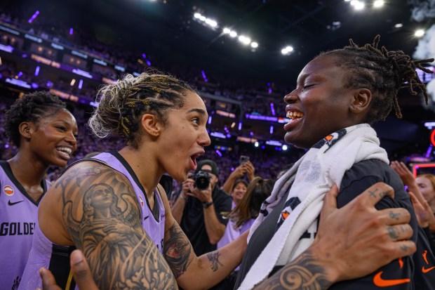 Golden State Valkyries' Gabby Williams (1) celebrates with teammate Aminata Gueye (31) after Game 1 of the WNBA Semifinals at Chase Center in San Francisco, Calif., on Sunday, Oct. 4, 2026. The Golden State Valkyries defeated the Las Vegas Aces 71-60. (Jose Carlos Fajardo/Bay Area News Group)