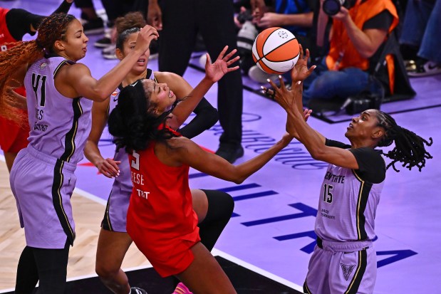 Golden State Valkyries' Tiffany Hayes (15) battles Atlanta Dream's Angel Reese (5) for a rebound in the fourh quarter of Game 1 of the WNBA Finals at Chase Center in San Francisco, Calif., on Saturday, Oct. 17, 2026. The Golden State Valkyries defeated the Atlanta Dream 68-64. (Jose Carlos Fajardo/Bay Area News Group)
