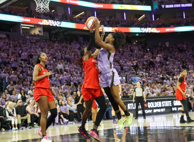 Golden State Valkyries' Kaila Charles (6) takes a shot against Atlanta Dream's Rhyne Howard (10) in the fourth quarter during game 1 of the WNBA Finals at the Chase Center in San Francisco, Calif., on Saturday, Oct. 17, 2026. (Shae Hammond/Bay Area News Group)