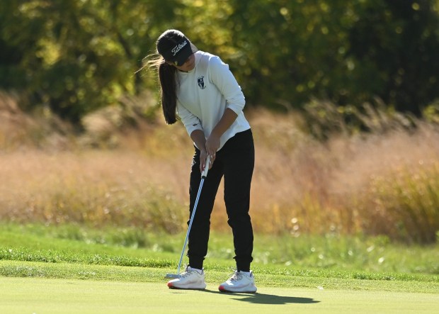 Utica Eisenhower's Emanuella Miracovic putts the ball Wednesday at the Division 1 Twin Lakes girls golf regional on Oct. 7, 2026. (DAN STICKRADT -- MediaNews Group)