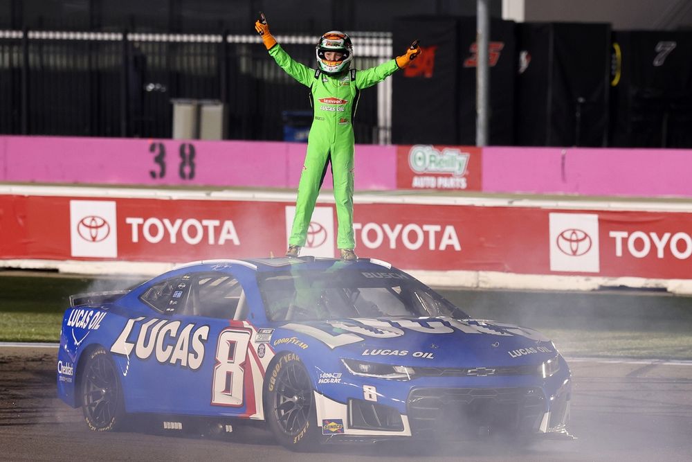 Brexton Busch stands atop his father Kyle Busch's Richard Childress Racing Chevrolet