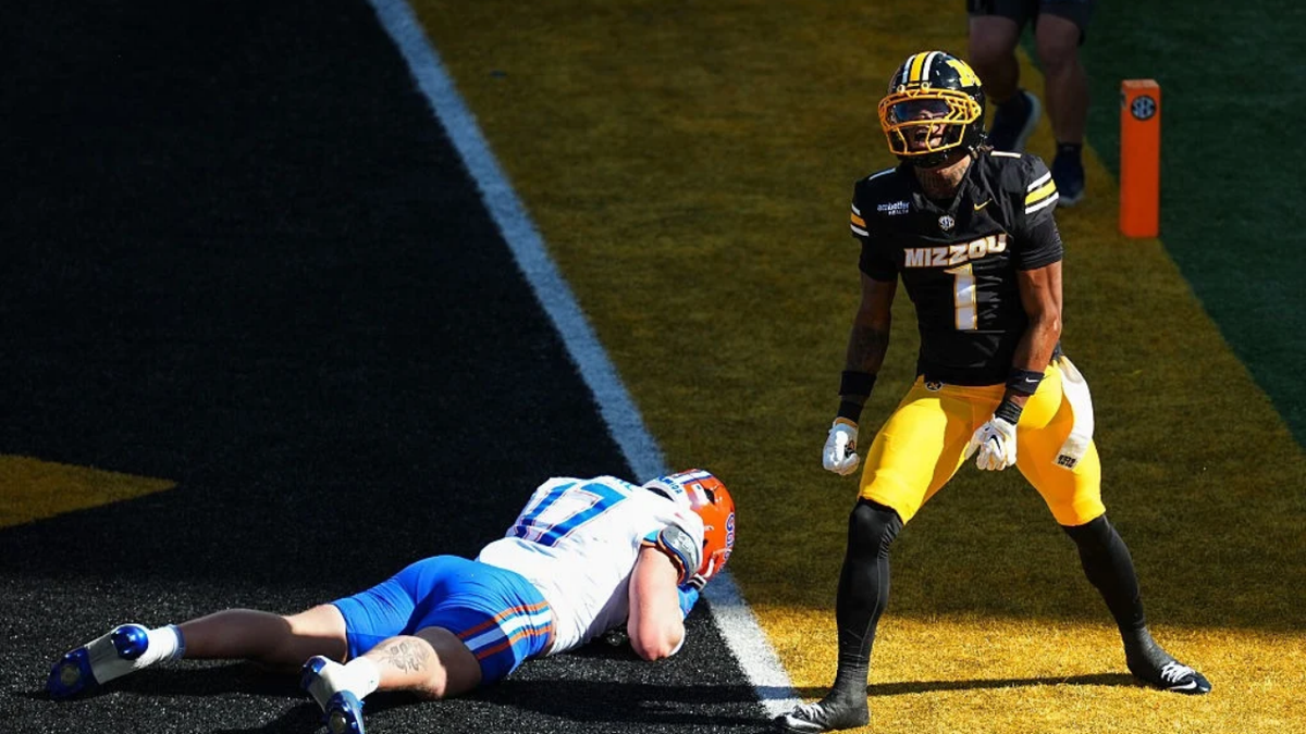 Chris Graves Jr. celebrates after breaking up a pass at Faurot Field.