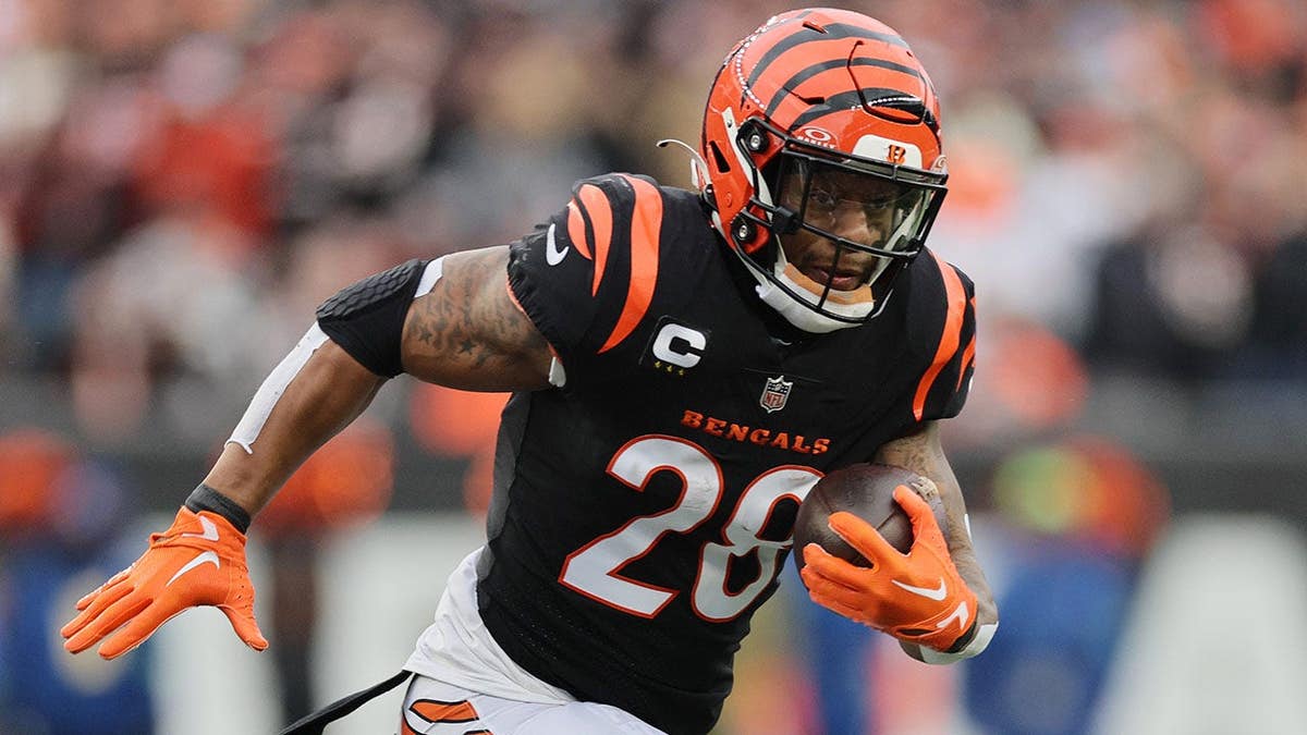 Joe Mixon runs the ball during a game at Paycor Stadium.
