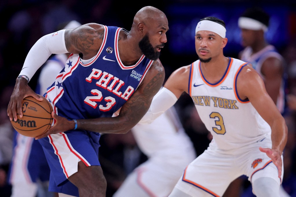 Philadelphia 76ers forward LeBron James (23) controls the ball against New York Knicks guard Josh Hart (3).