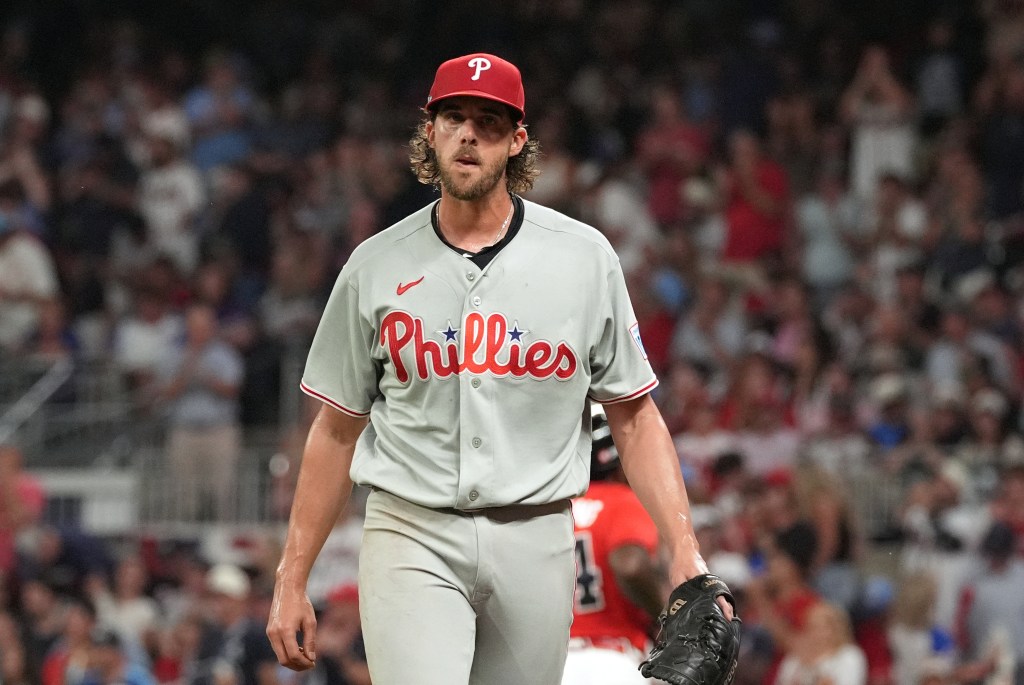 Philadelphia Phillies starting pitcher Aaron Nola walks to the dugout after the first inning against the Atlanta Braves.