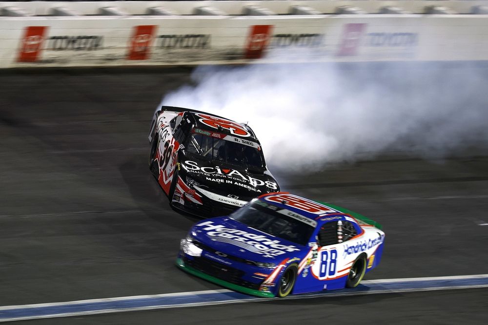 Ryan Sieg spins off the bumper of Rajah Caruth